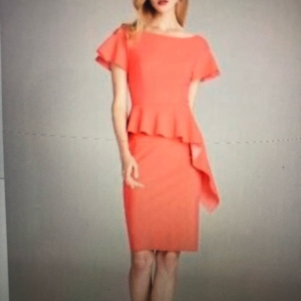 Teri John. Size 14.  Pretty coral color. Like new!